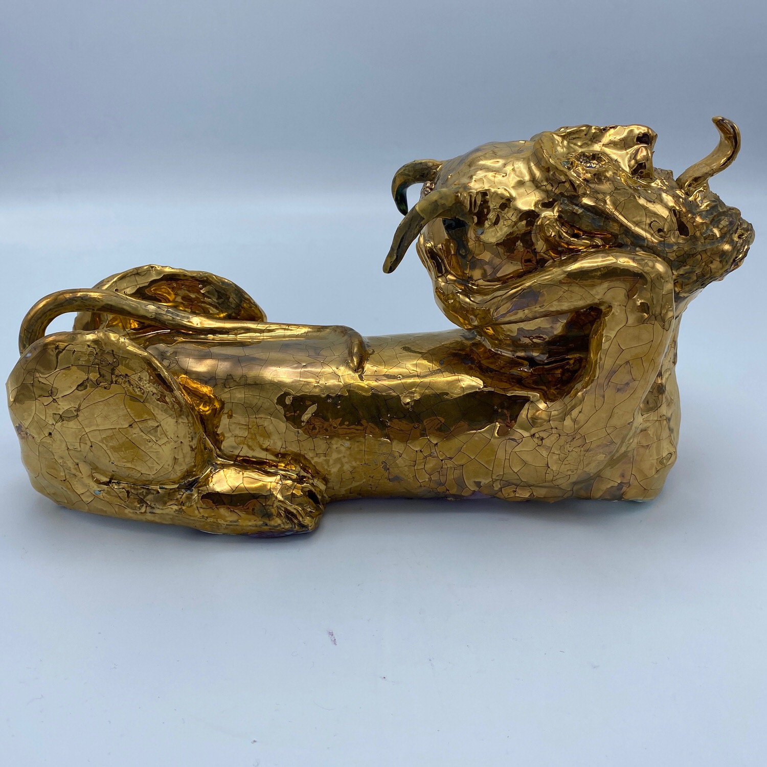 Satyri (holding it’s head)